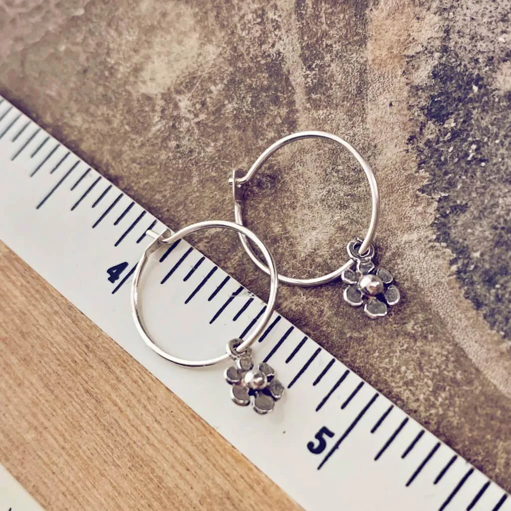 daisy // teeny tiny sterling silver daisy flower sleeper earrings