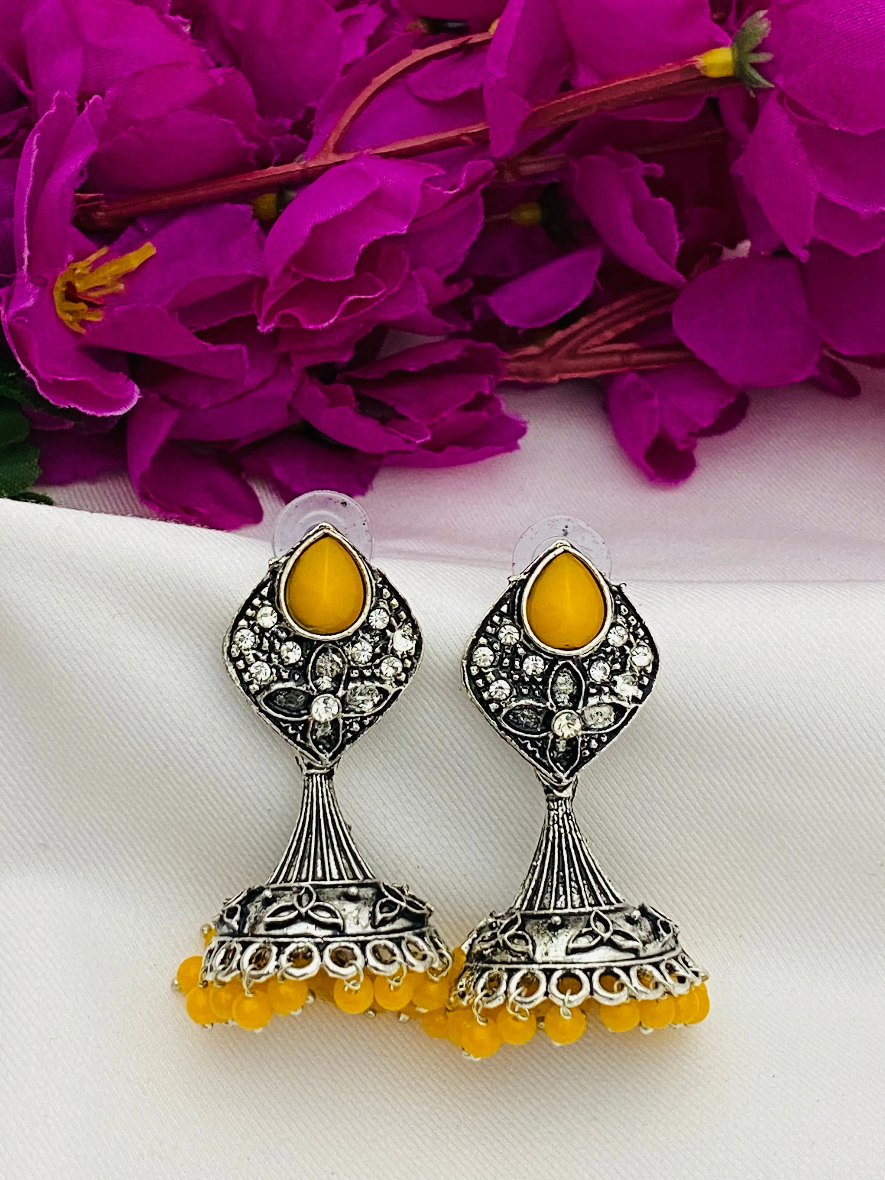 Elegant Yellow Color Stone Beaded Flower Designer Silver Toned Oxidized Jhumka Earrings With Beads